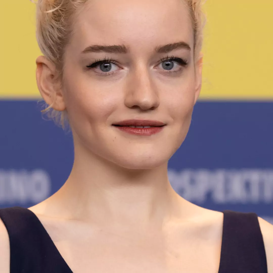 Julia Garner at a public event, looking elegant and composed