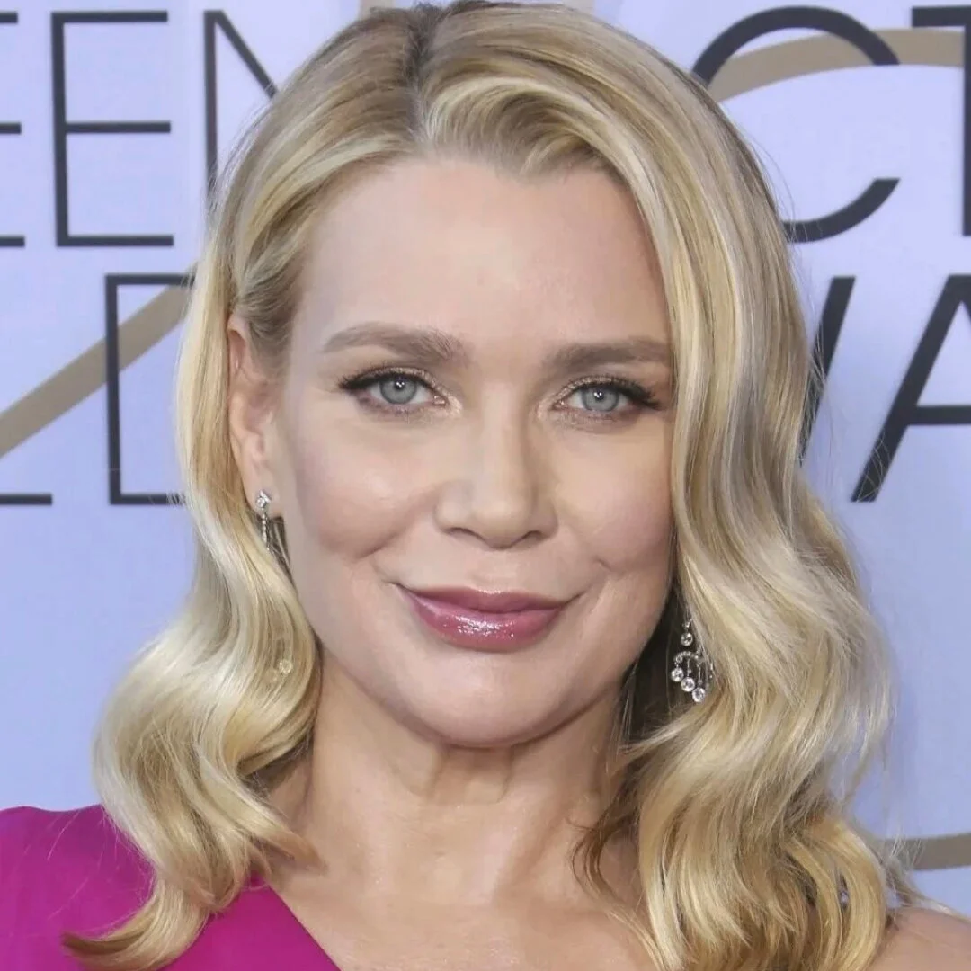 Laurie Holden, actress smiling at an awards event.