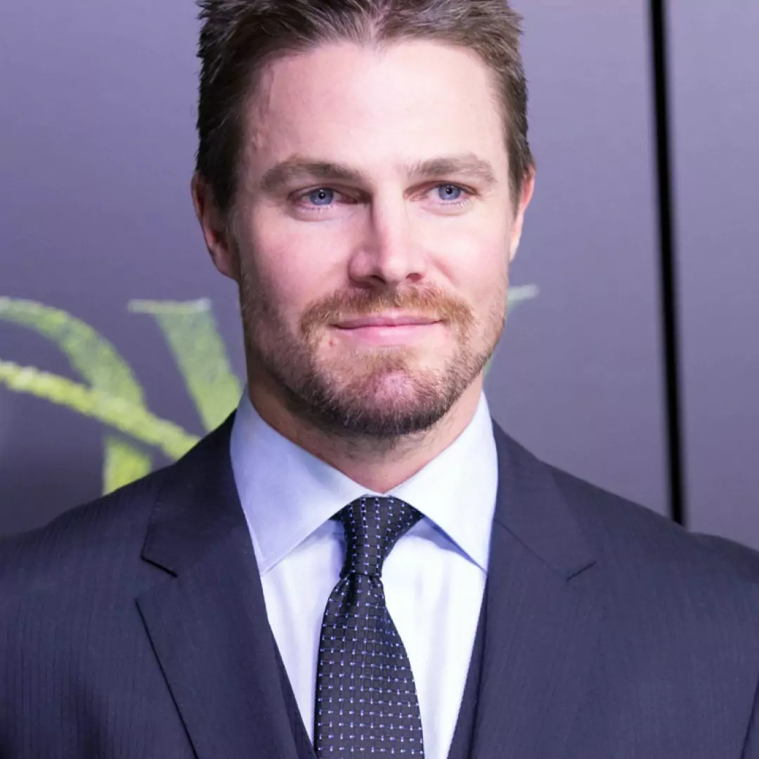 Stephen Amell at a premiere event, known for his role as Oliver Queen on the TV series Arrow