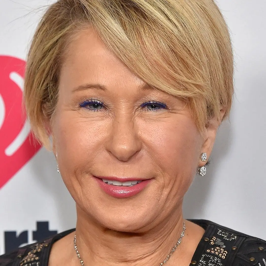 Yeardley Smith, American actress siling at a red carpet event.